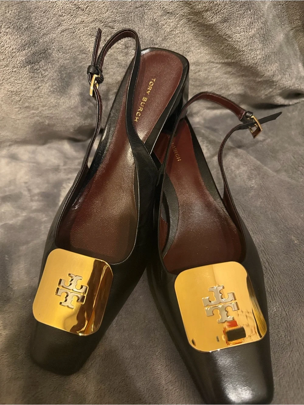 Tory Burch Black Leather Slingback Mules with Gold Plaques